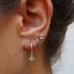 Ensemble Ohrringe und Piercings – Vielseitigkeit und subtile Brillanz 
